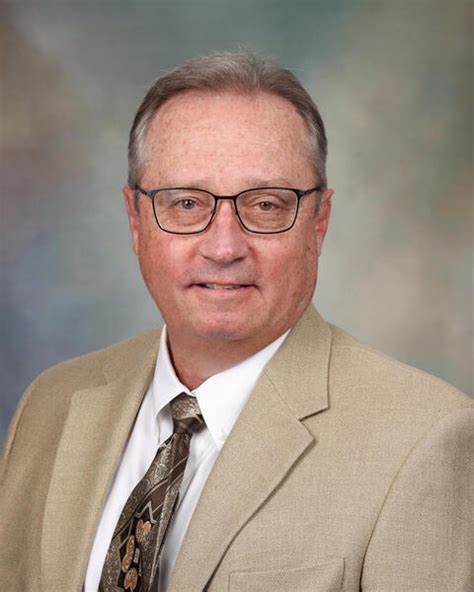 Dr. Mark K. Lyons